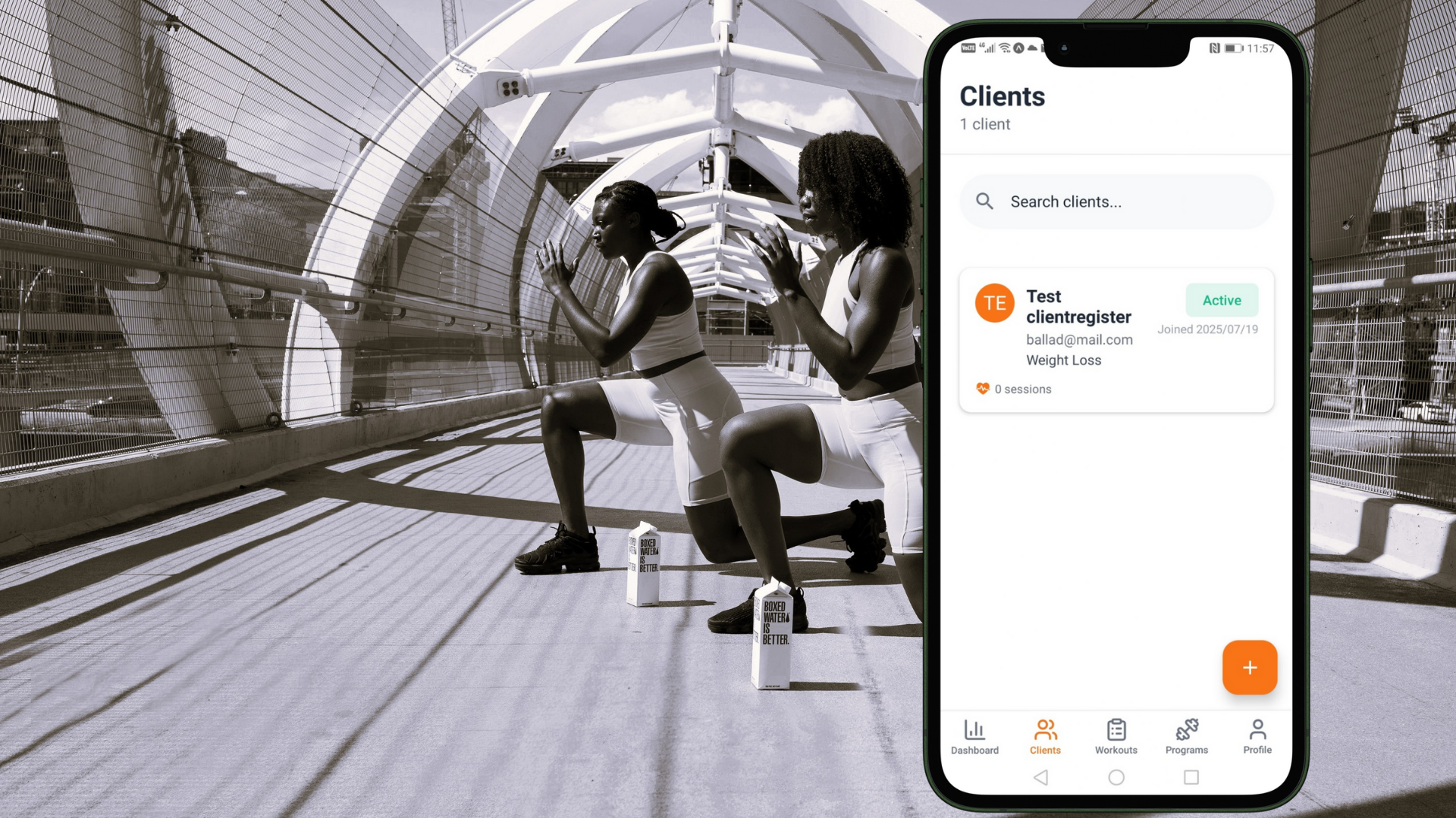 Personal trainer working with client using app